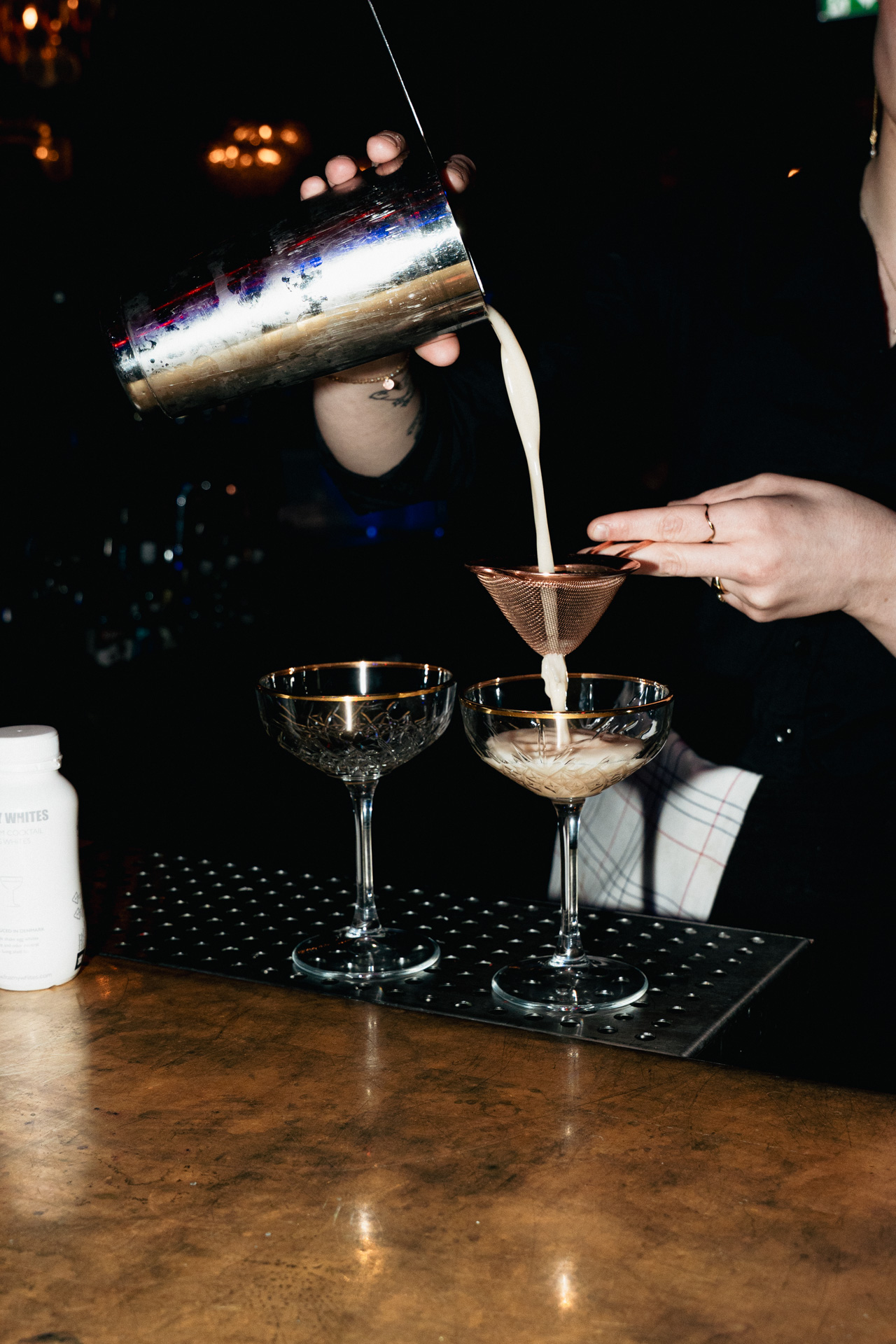 Silky foam strained into a chilled coupe.
