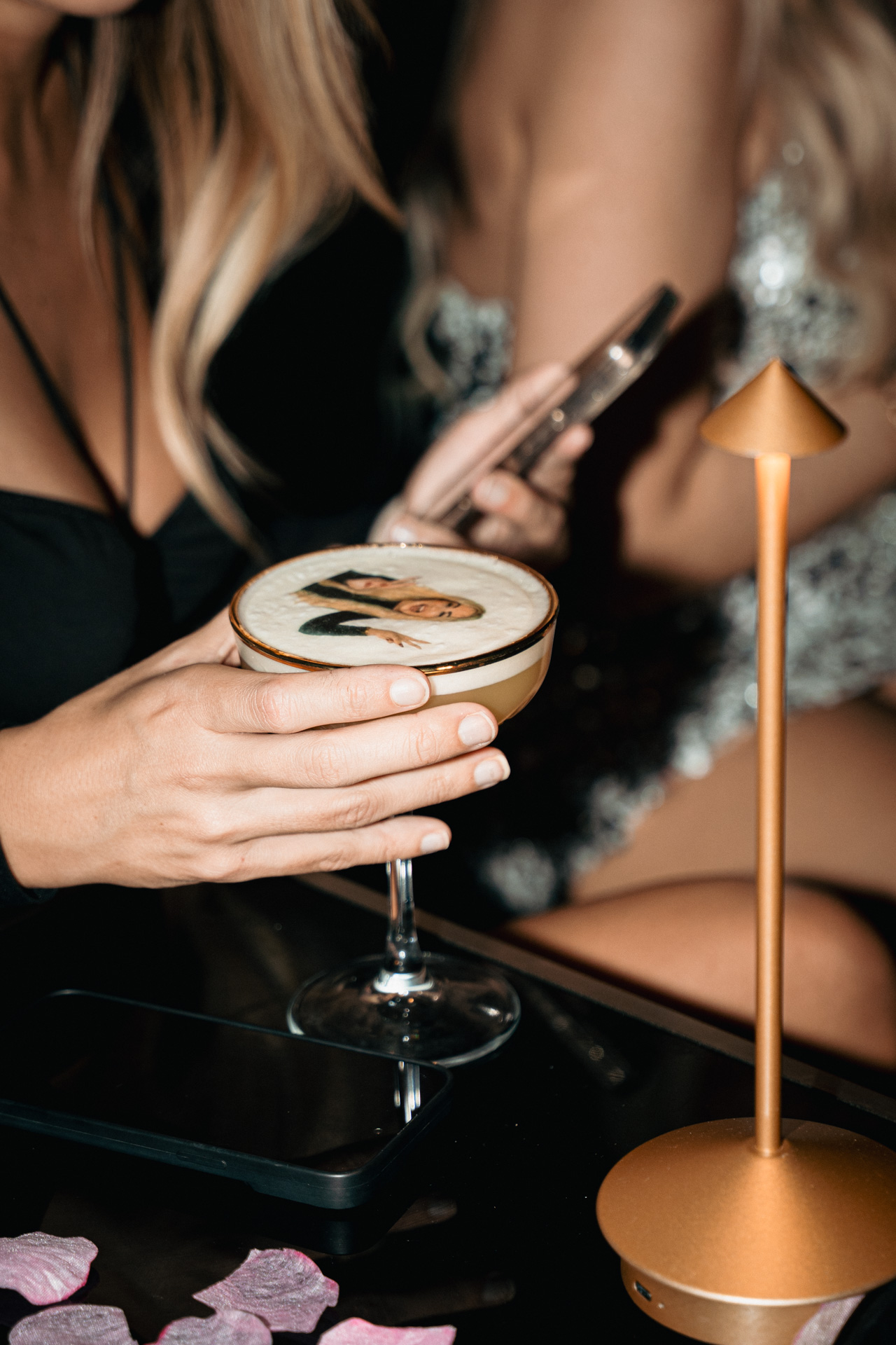Cocktails leaving the bar.